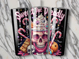Halloween themed tumbler with skull, candy, and spooky treats.