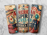 Tumbler with American flag, cowboy hat, boots, horseshoe, and text "The American Spirit Lives On."