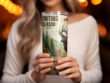 Tumbler with elk and forest graphic and text "Hunting Season".