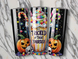 Three tumblers with Halloween designs featuring pumpkins, skulls, candy corn, and "Get TRICKED OR TREAT YOURSELF" text.