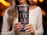 Woman holding a glittery tumbler with "Witch Please" text.