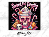 Pink iced skull cup with candy canes, skulls, and candy.