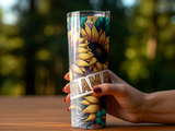 Sunflower Mama tumbler held by a woman's hand.