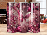 Three tumblers with pink butterfly and floral glitter designs.