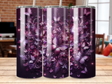 Purple floral and butterfly sublimation design on a tumbler.