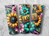 Three tumblers with sunflowers and colorful flowers, one with "LOVE" sign.