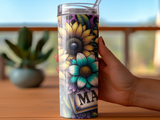 Sunflower and teal floral art on a personalized tumbler held by a hand.