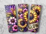 Three tumblers with sunflowers, pink flowers, and purple glitter zebra stripes.