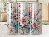 Floral and butterfly pattern on a set of three tumblers.