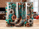 Cowboy boots with floral and turquoise embellishments on a wooden surface.