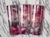 Three tumblers featuring a pink and purple butterfly and floral glitter design.