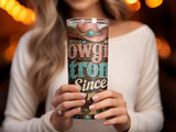 Tumbler with pink cowgirl hat and "Cowgirl Strong Since 1971" text.