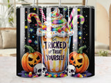 Halloween tumbler with "Get Tricked or Treat Yourself" text, pumpkins, skulls, and candy.