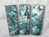 Three tumblers with iridescent teal butterflies and swirling patterns.