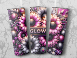 Three glittery tumblers adorned with pink and silver flowers and the word "GLOW".
