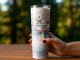 Tumbler with denim pattern, pink bow, and pearl and flower embellishments.