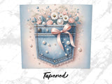 Denim jeans pocket adorned with pearls, pink ribbon, and delicate flowers.