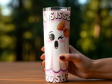 Pink ghost tumbler with "Boo S**t" text and orange bow, held by a hand.
