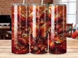 Three tumblers with a vibrant, ornate butterfly and floral design.