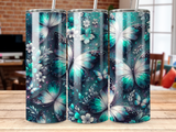 Teal and white butterfly and floral pattern on a tumbler.