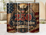 Triptych tumbler with eagle, US flag, and "250 Years of Freedom 1776-2026" text.