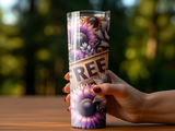 Tumbler with sunflower pattern and "FREE" text held by a hand.