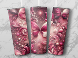 Pink butterfly design on three tumblers with glitter and swirls.