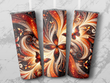 Three tumblers with a warm, glowing floral and butterfly pattern.