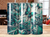 Teal and emerald green glitter butterfly pattern on a tumbler.