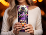 Halloween tumbler with spooky castle, pumpkins, and candy designs.