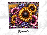 Sunflower and rose floral arrangement with black and white striped border.