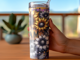 Sunflower tumbler with "AM" text held by a hand.