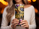 Woman holding a tumbler with sunflowers and the word "HAPPY".