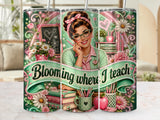 Teacher with books and flowers, "Blooming where I teach" text.