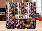 Three tumblers with sunflowers, roses, and "KIND" text on a wooden surface.