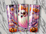 Pink ghost with bow and glasses, surrounded by Halloween candy and pumpkins.