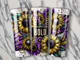 Three tumblers with bold sunflowers and purple floral designs on a marble surface.