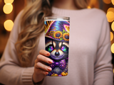 Witch hat raccoon with sunflower accents on a tumbler.