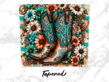 Teal embroidered cowboy boots with floral accents and sunflowers.