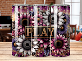 Sunflower and floral pattern with "PLAY" text on a tumbler.