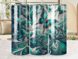Three tumblers with a repeating emerald green and teal butterfly and floral design.