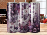 Three tumblers with a purple floral and butterfly design.