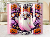 Cute ghost wearing glasses with Halloween pumpkins and candy.