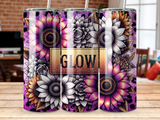 Tumbler with sunflowers and the word "GLOW" in a gold frame.