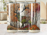 Deer silhouette blending into autumn forest scene with "Hunting Season" text.